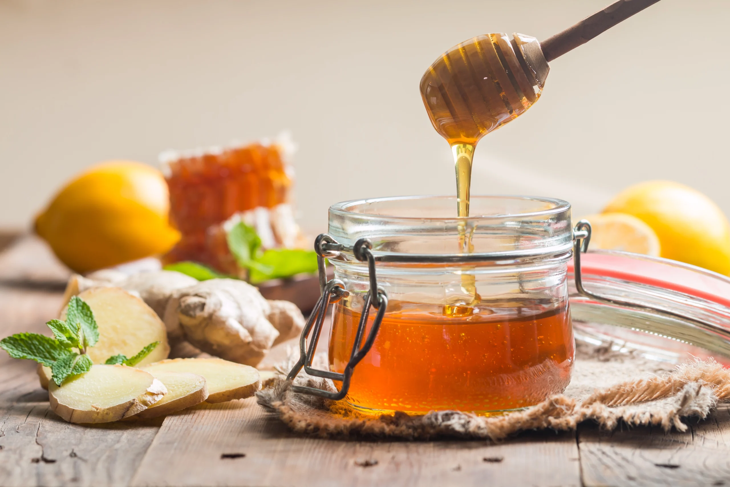 honey-in-jar-with-ginger-and-lemon-2025-01-09-02-49-29-utc (1) manfaat madu dan jahe